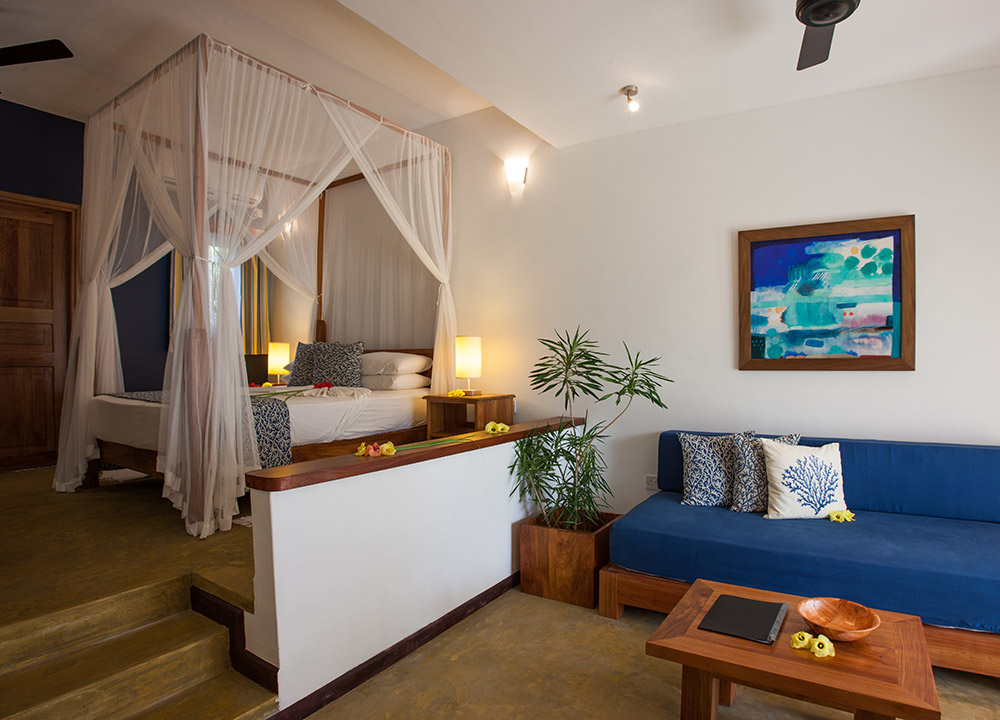 Garden and sea view apartment, with canopied bed and sitting area